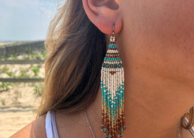 Aztec Sea Ombre Fringe Woven Earrings on model.