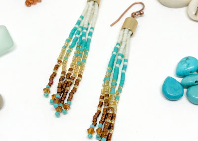 Aztec Sea Ombre Fringe Tassel Earrings on white background.