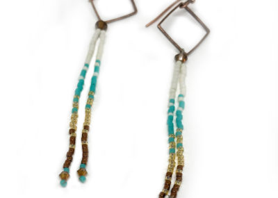 Aztec Sea Ombre Fringe Drop Earrings on white background.