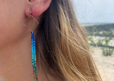 Beach Ombre Drop earrings on model.