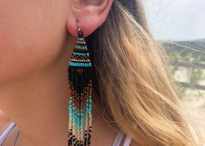 Regal Night Out Fringe Ombre Woven earrings on model.