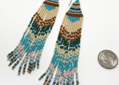 Wave of Blue Fringe Ombre Woven earrings sizing with dime.