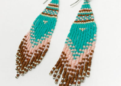 Southwestern Fringe Woven Ombre earrings on white background.