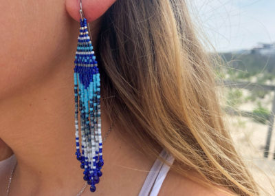 Wave of Blue Fringe Ombre Woven Earrings on model.