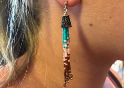 Southwestern Fringe Ombre Tassel earrings on model.